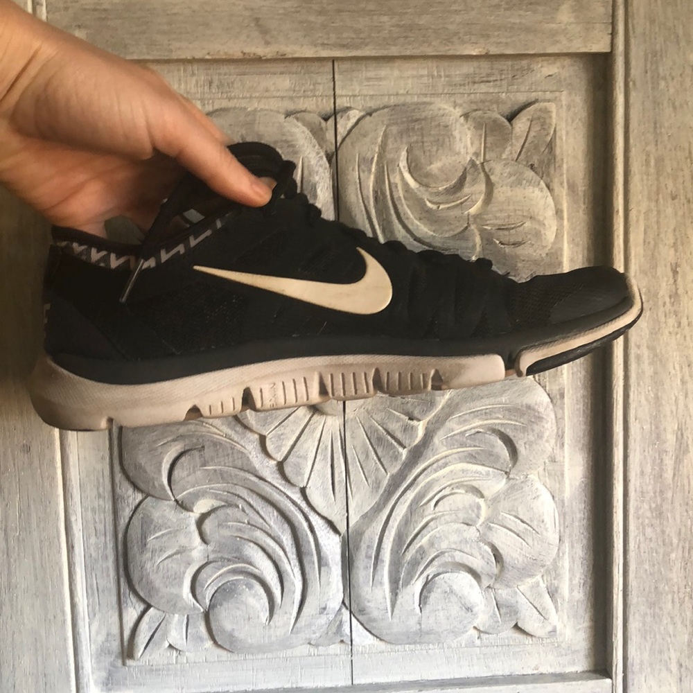 pair of black Nike’s
